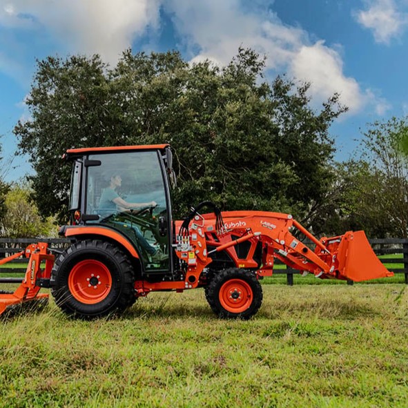 Kubota LX3520HSDC cab tractor with LA545 loader and Land Pride implements