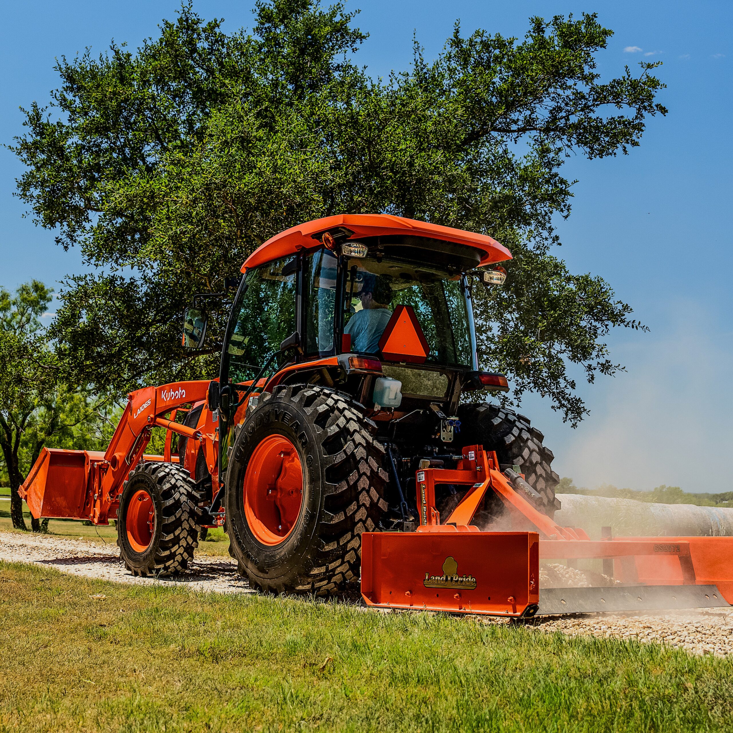 Kubota MX5400HSTC cab tractor with LA1065A loader and Land Pride implements package