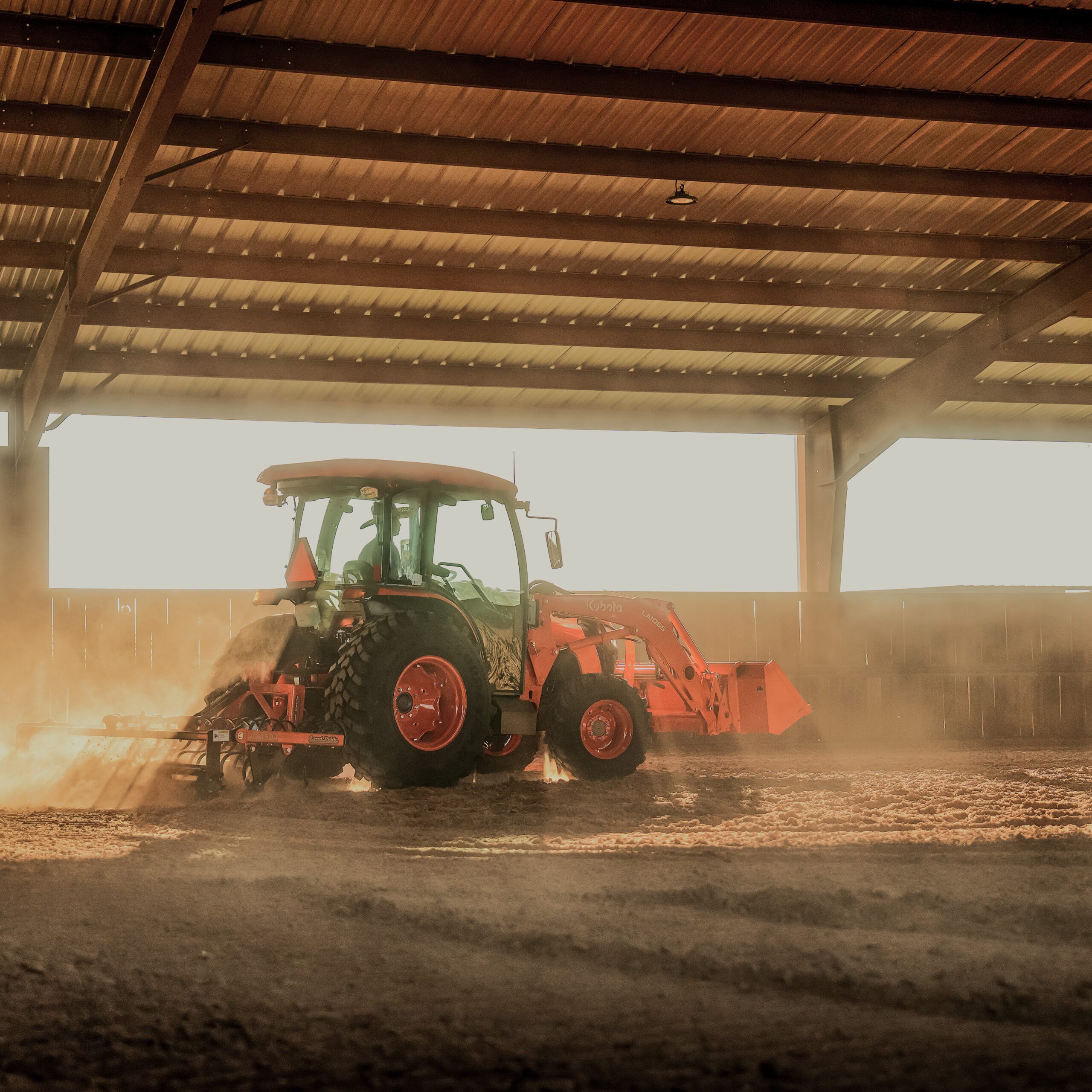 Kubota MX6000HSTC cab tractor package with Land Pride implements