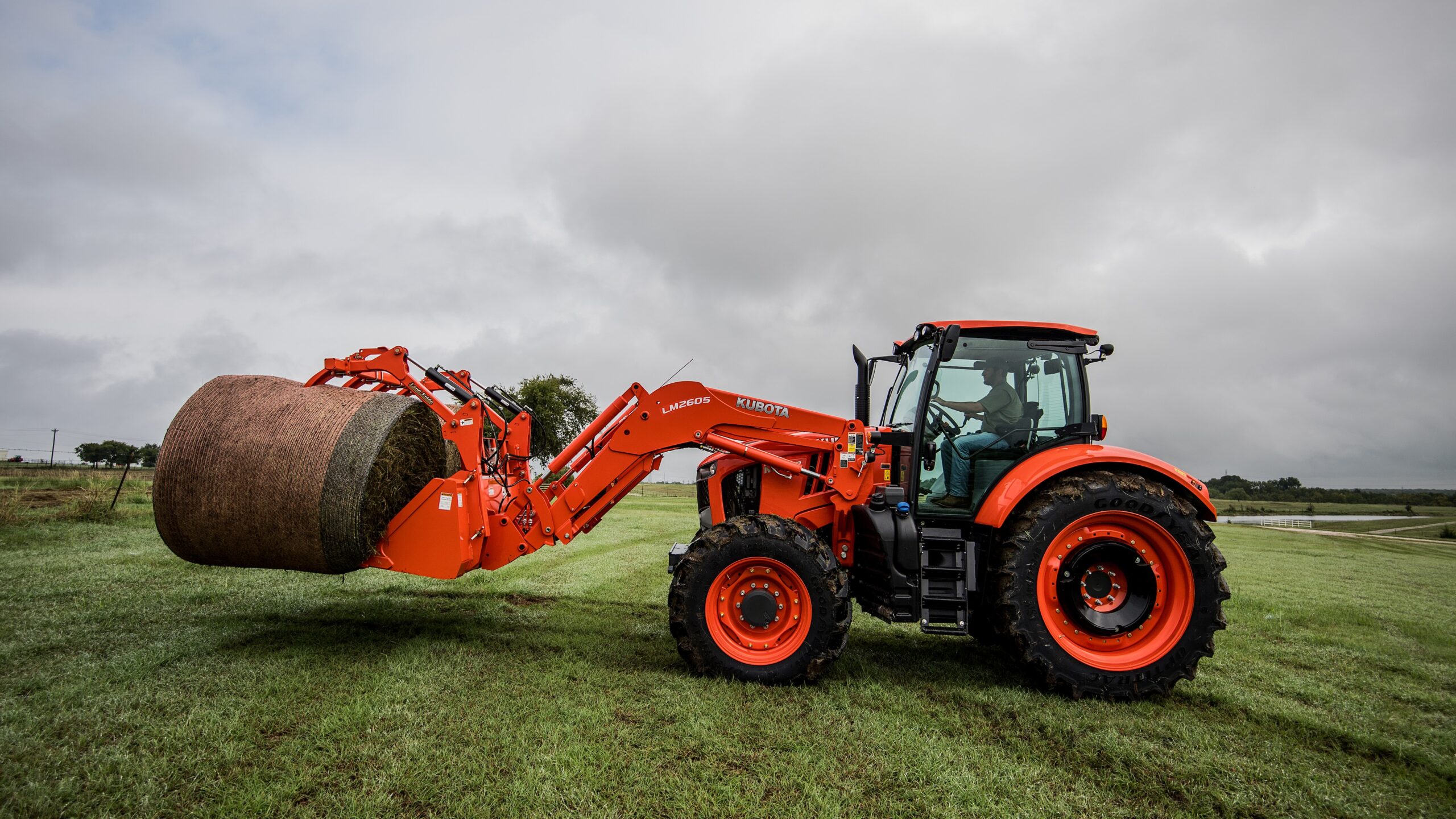 Kubota M7 loader handling large materials