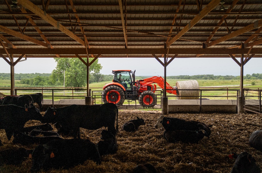 Kubota M7 tractor doing ranch work