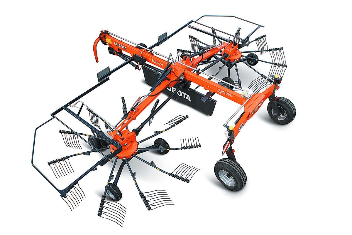 Kubota rotary rake forming a clean windrow
